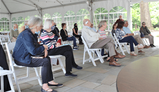 UCHS members seated under an outdoor pavilion during the May 2021 Show & Tell meeting.