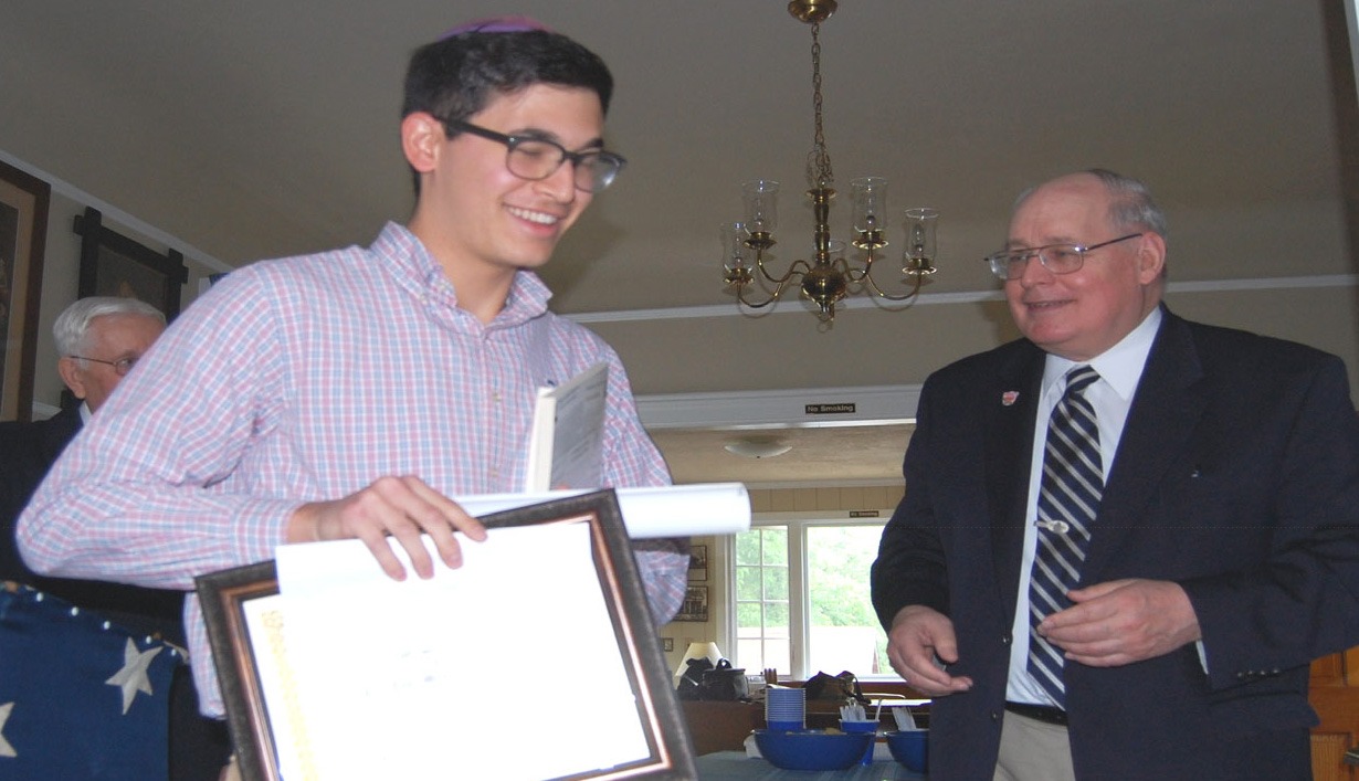 Michael Glaser of Rav Teitz Mesivta Academy receiving a Union County Historical Society student award at the Hanson House