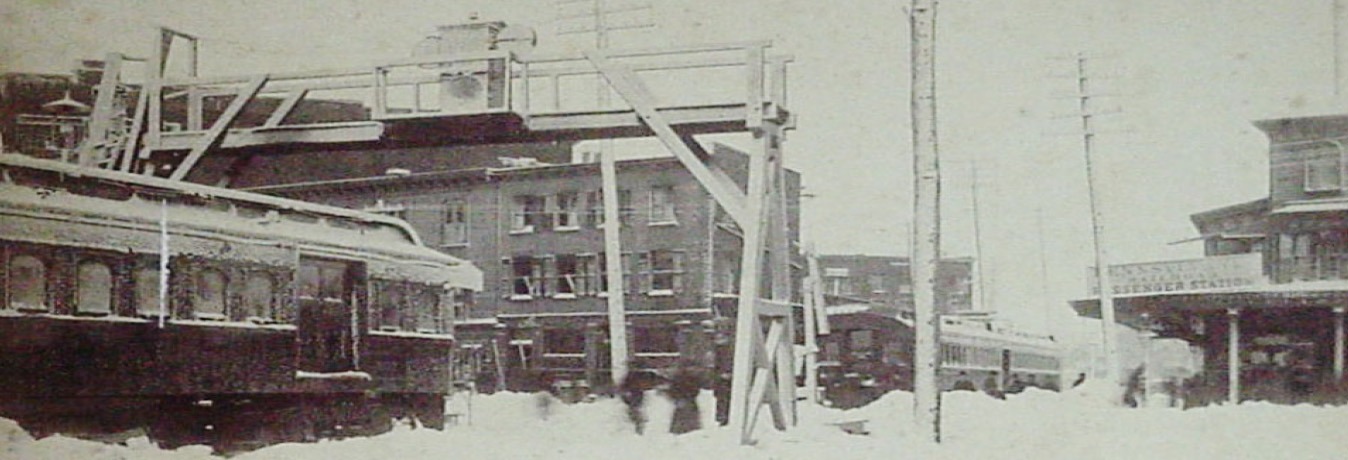 Historic Blizzard of 1888 scene showing deep snow burying trains and buildings in Elizabeth, New Jersey.