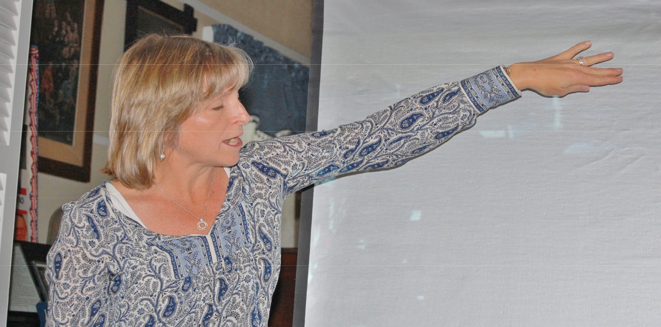 Marybeth Lapham of the Snyder Academy presenting a slide show on historic preservation at a UCHS meeting.