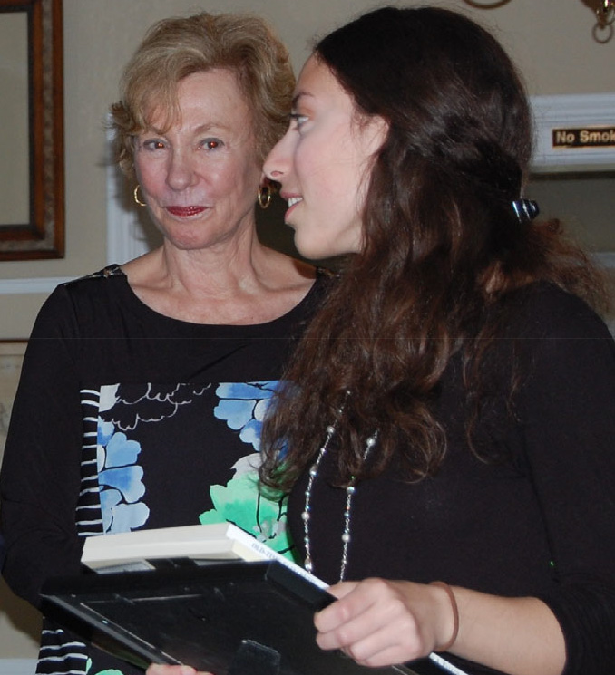 Close-up view of a student award presentation during the UCHS May 2016 meeting at the Hanson House.
