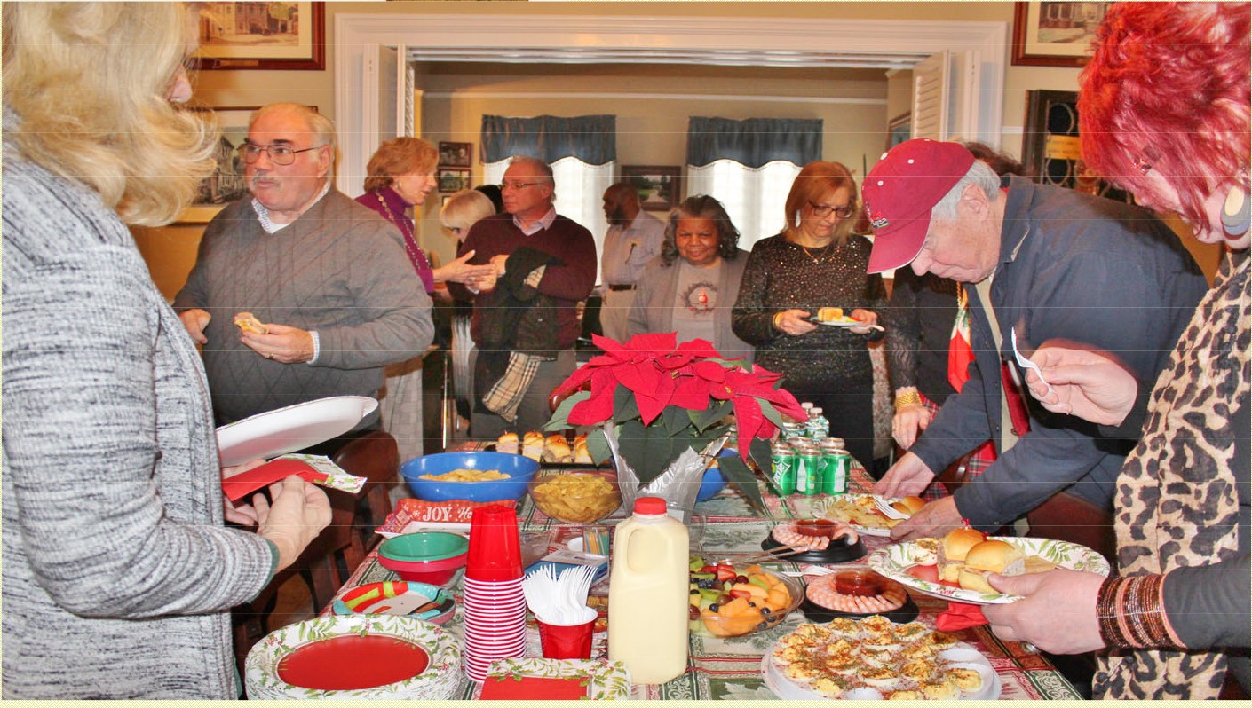 Union County Historical Society members enjoying refreshments at the December holiday meeting