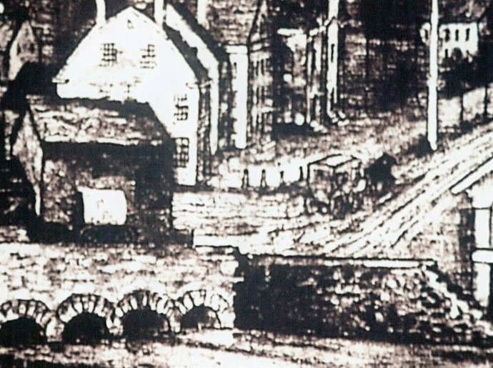 Archival image of an old stone bridge with multiple arches.
