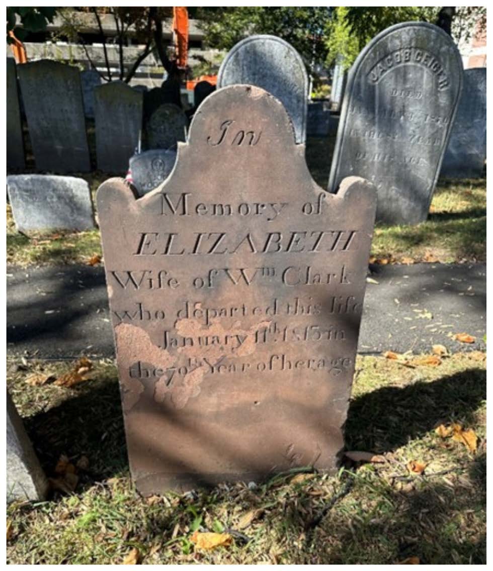 Cleaned gravestone after restoration showing “In Memory of Elizabeth, Wife of Wm Clark” more clearly.