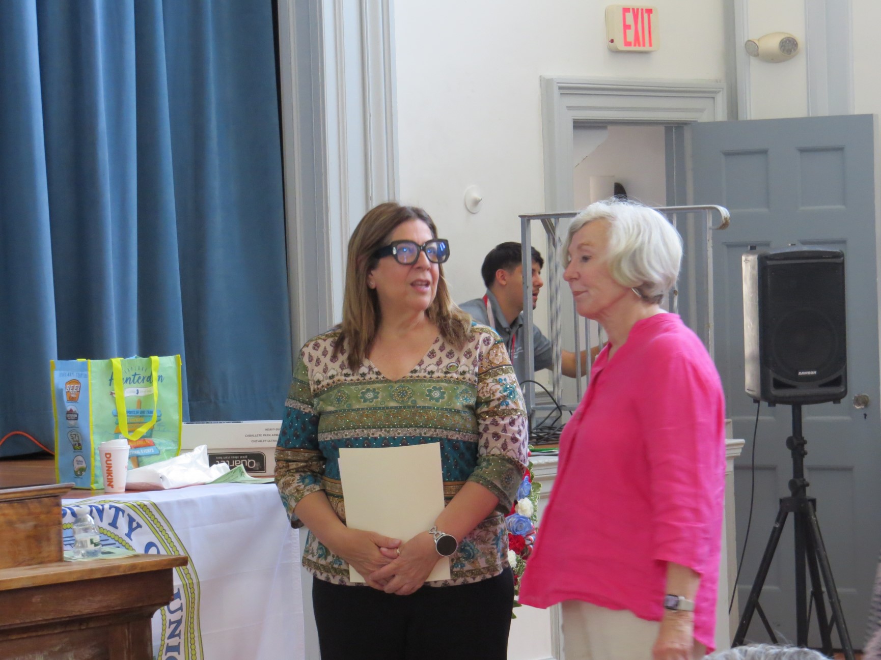 Attendees speaking during the Caldwell Memorial rededication gathering inside Snyder Academy, Elizabeth, NJ